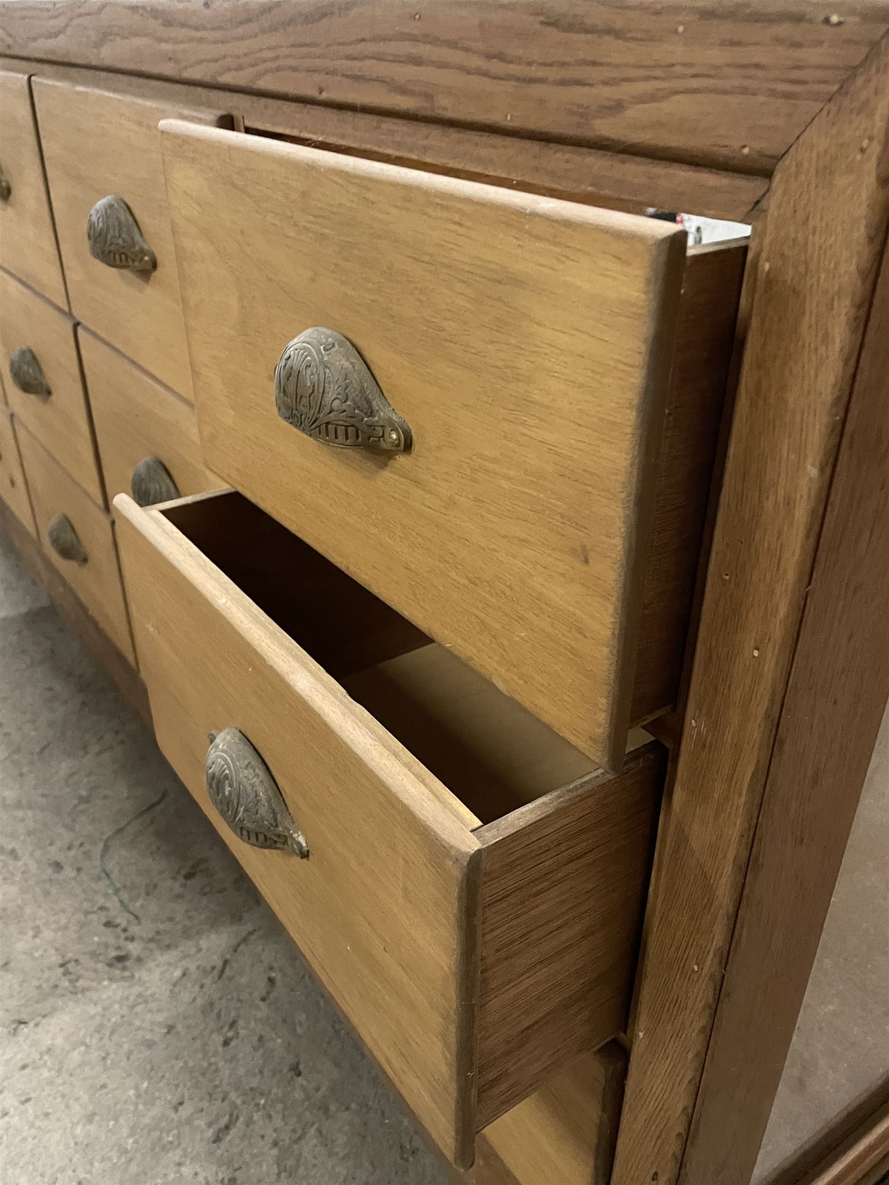 20th century oak and glazed haberdashery shop's display cabinet, fitted with twelve slides, on skirted base - THIS LOT IS TO BE COLLECTED BY APPOINTMENT FROM THE OLD BUFFER DEPOT, MELBOURNE PLACE, SOWERBY, THIRSK, YO7 1QY