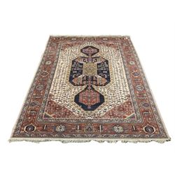 Persian Keshan design carpet, the central pole medallion decorated with bird motifs, repeating trailing design to field with stylised flower heads, four band border 