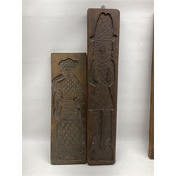 Eight 20th century hardwood Dutch folk art Speculaasplank or biscuit moulds, most examples typically carved with figures in traditional dress, tallest H60cm