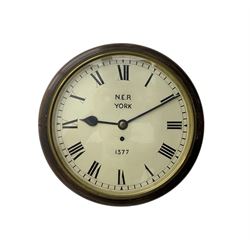 English - 8-day single train Fusee wall clock, with a mahogany dial surround and brass bezel, painted dial with Roman numerals , minute track and steel spade hands, dial inscribed N.E.R. YORK .1377. wire driven fusee with square plates and recoil anchor escapement. With pendulum. 