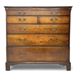 George III oak chest, rectangular top over frieze with inlaid with inscription panels 'Mary Rees' and fan motifs, frieze drawer over two short and three long graduating drawers, fitted with brass swan-neck handles and oval escutcheons, on bracket feet