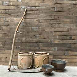 Early 20th century Scythe, two terracotta style planters, two brass planters