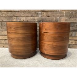 Four walnut circular barrel shaped lamp tables, fitted with single drawer