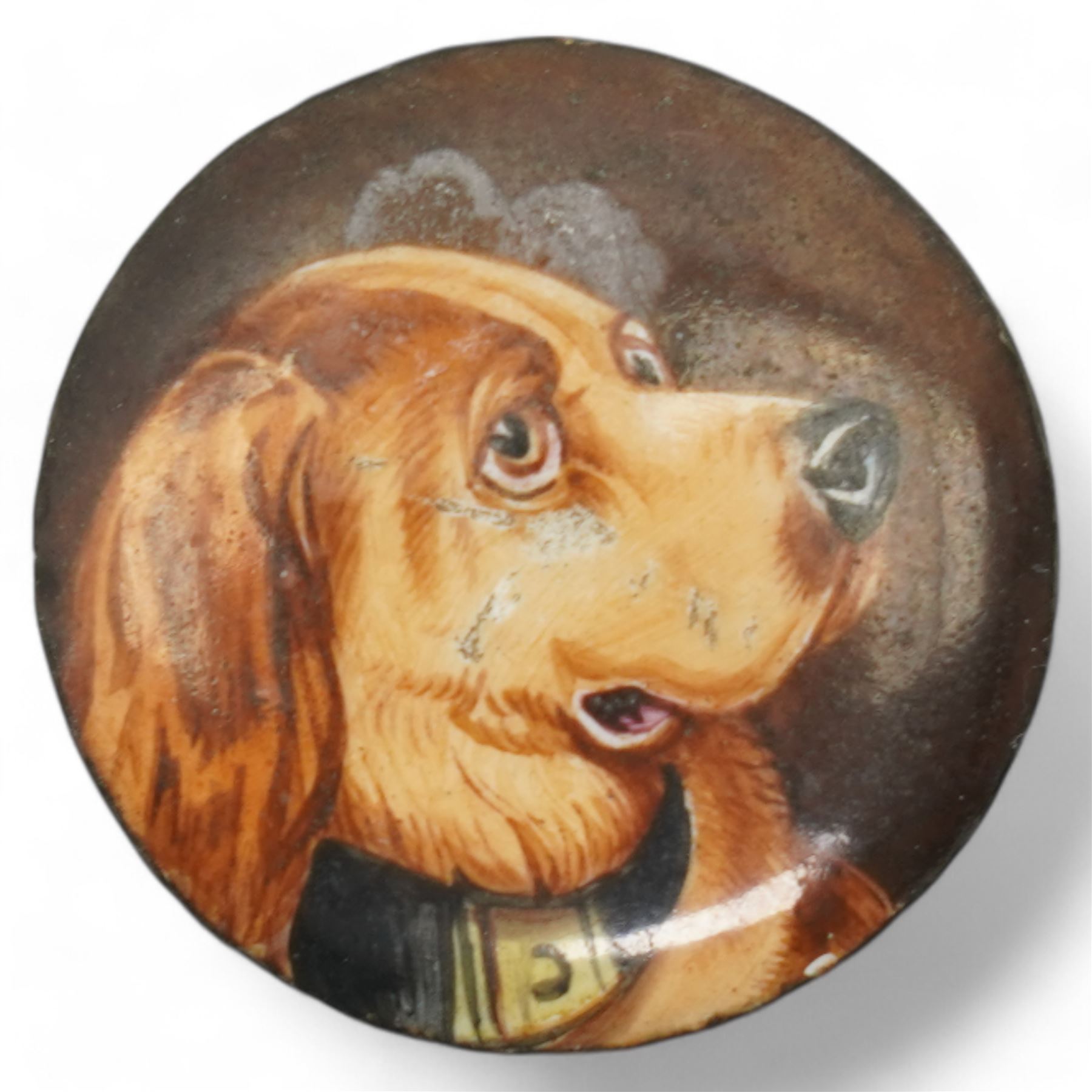 Three unmounted 19th century circular enamel discs, each painted with a portrait of a dog, comprising a Bloodhound after Sir Edwin Landseer, a Pug and a Terrier, all unsigned, D2.2cm (3)