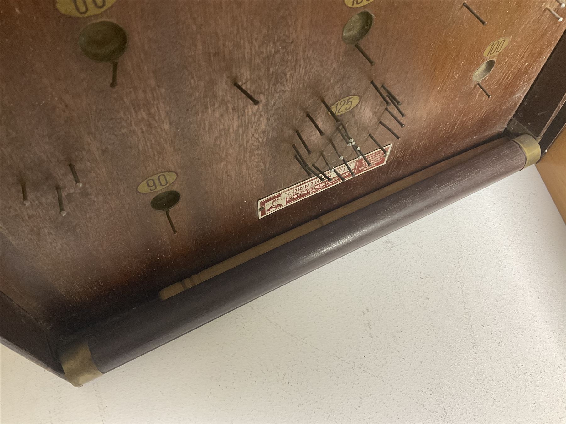 John Jaques and Son ‘Devil Among the Tailors’ wooden vintage skittles game, missing pole and ball, with instruction manual and original box; and a Corinthian Bagatelle board with marbles and push stick 