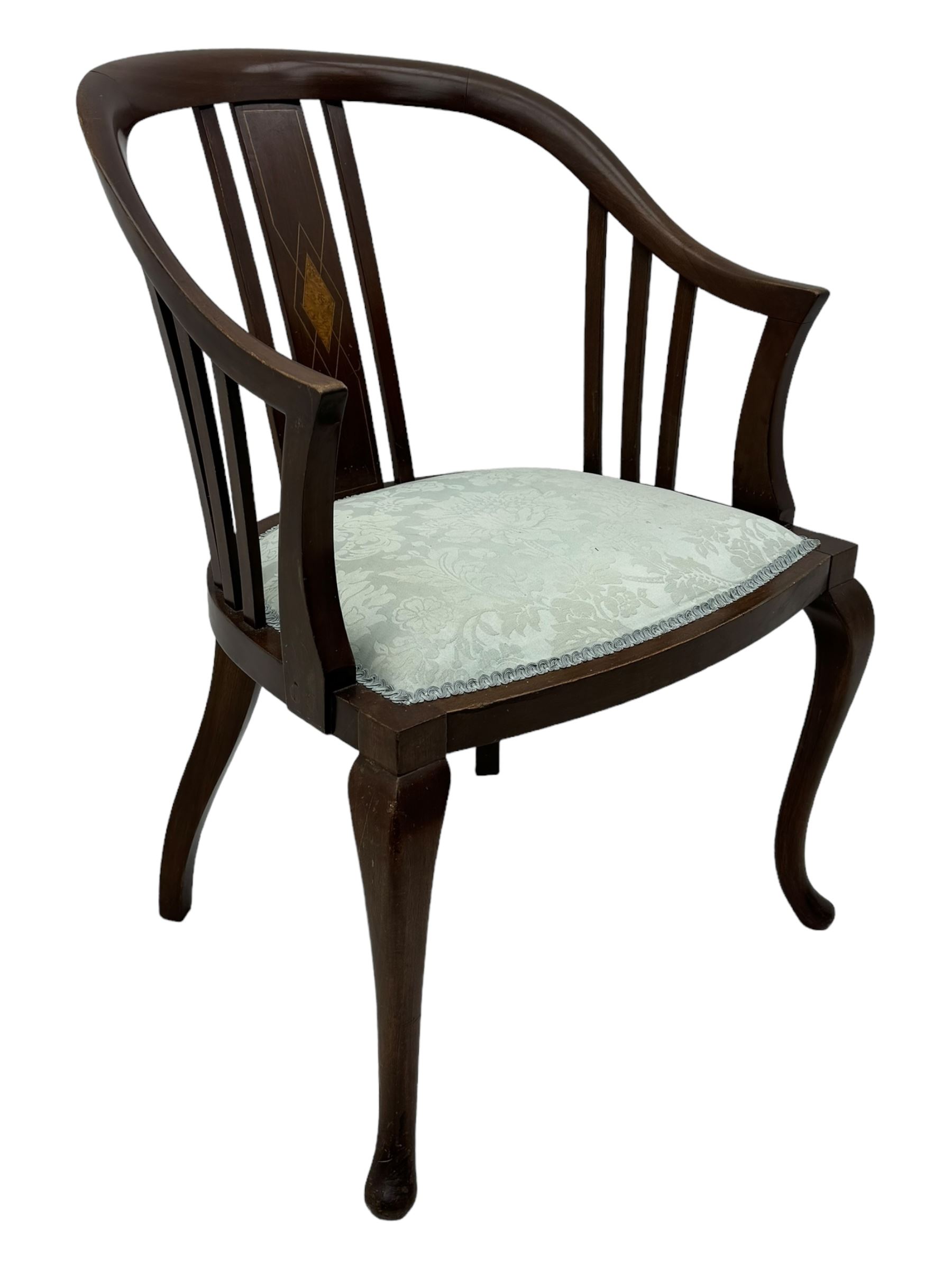 Edwardian inlaid mahogany tub-shaped armchair, curved backrest with inlaid central splat with diamond motif, over padded upholstered seat in pale blue damask fabric, on cabriole supports