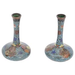 Pair of small Japanese Cloisonne bottle form vases, each decorated with foliate panels against a blue ground, H13cm, a similar pair of Japanese Cloisonne vases and Royal Worcester candle snuffer in the form of a Chinese man holding a fan, H9cm (5)