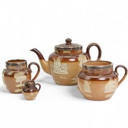 Royal Doulton & Doulton Lambeth Harvest pattern stoneware, comprising a silver mounted teapot, jug, loving cup and miniature jug (4)