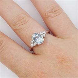 9ct white gold oval aquamarine and round brilliant cut diamond ring, hallmarked