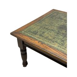 Large 10' 7'' late Victorian oak boardroom table, moulded rectangular top with inset green leather surface, on turned and reed moulded supports with brass and ceramic castors 