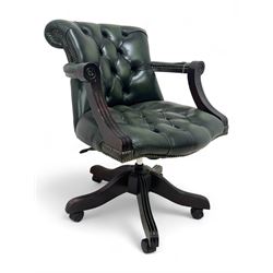 Victorian design Captains swivel desk chair, rolled tub shaped back with open arms, upholstered in deep buttoned green leather with studwork border