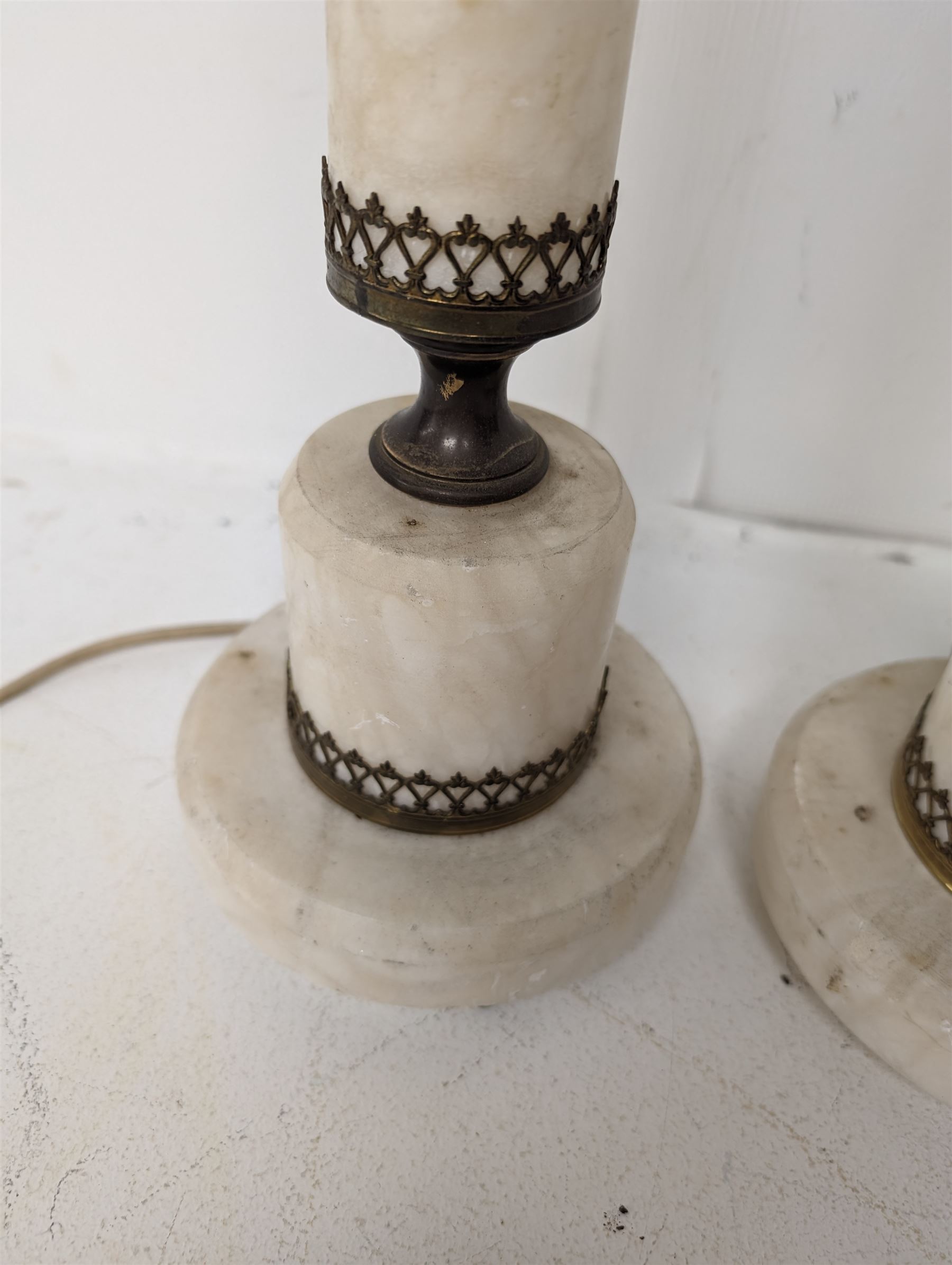 Pair of white stone and brass table lamps, H45cm