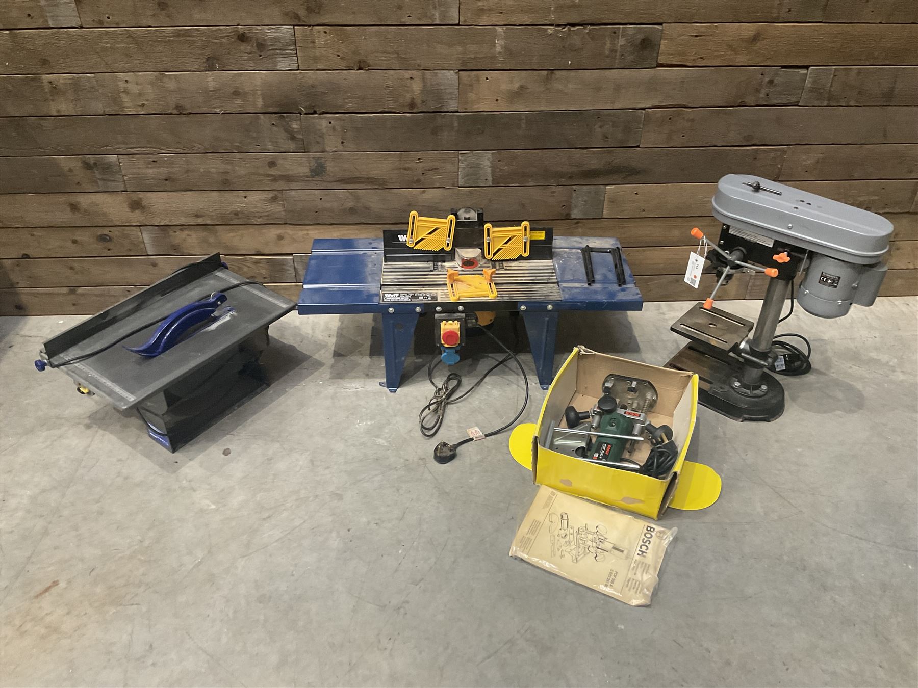 Terratek pillar drill, Wolf router with table, Bosch router and an Energer table saw