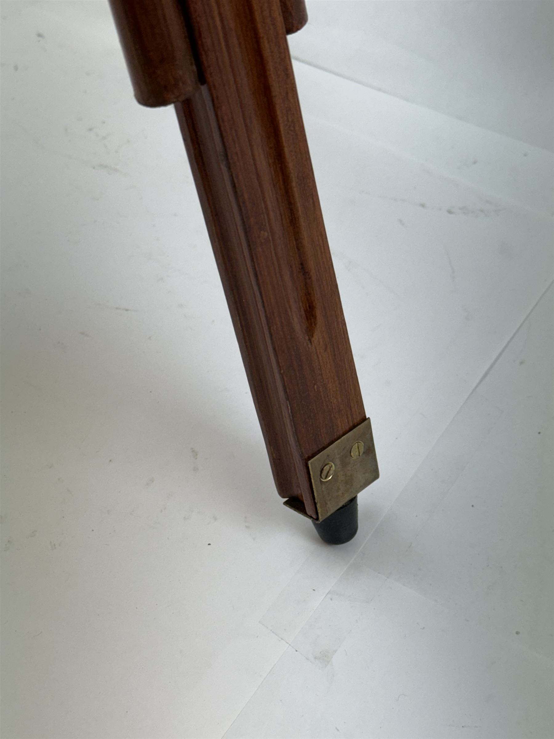 Brass telescope upon a wooden adjustable tripod, H55cm 