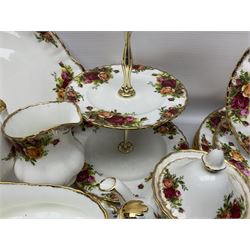 Royal Albert Old Country Roses pattern coffee service for six, comprising coffee pot, milk jug, cups and saucers, cake plate, together with miniature teapot, six teacups and saucers, six dinner plates, six side plates etc 