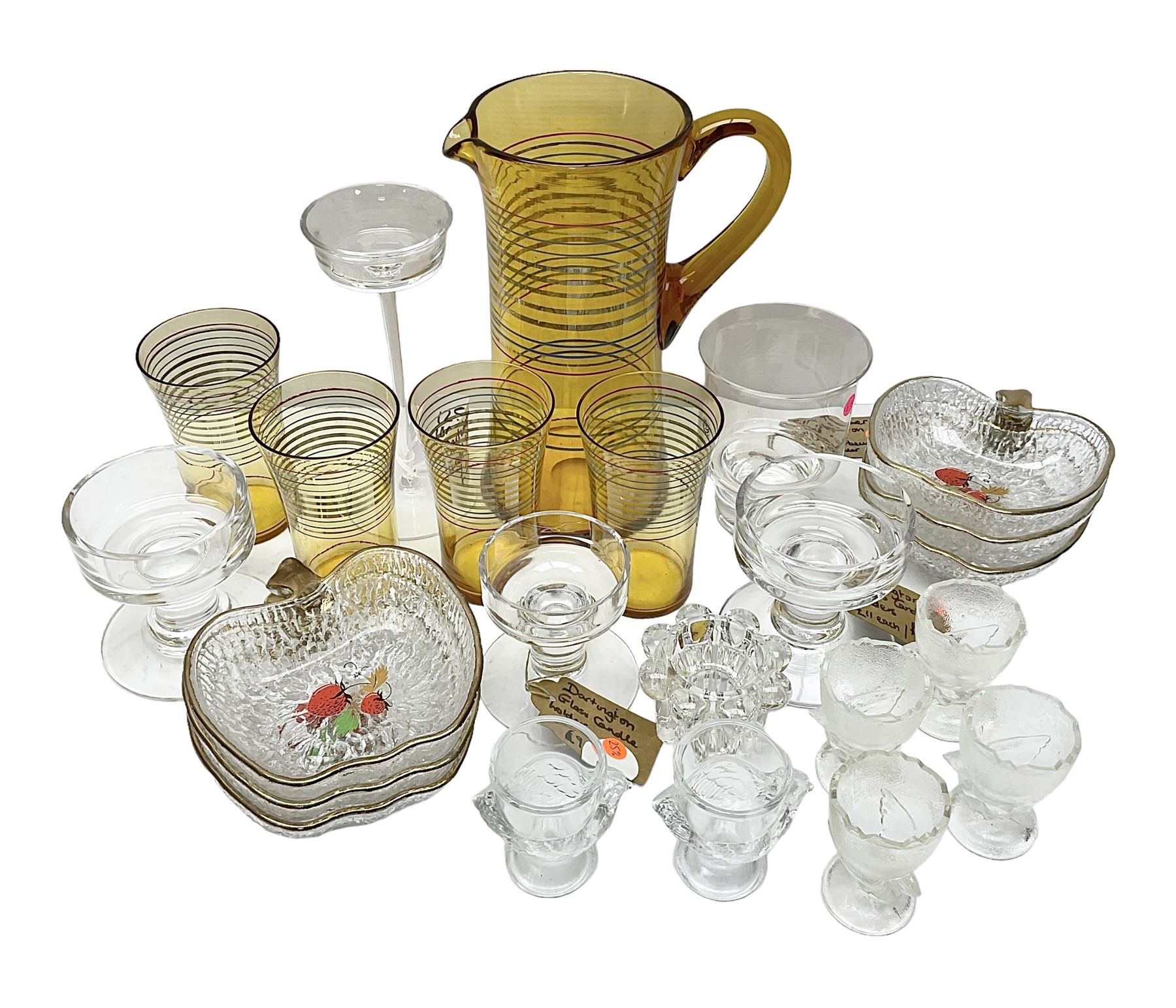 Amber glass lemonade pitcher with four glasses, together with apple shaped bowls and other glassware 