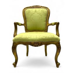 Late 20th century French design gilt framed armchair, upholstered in lime green damask fabric, arched back with carved crest, scroll arms, serpentine front rail, on cabriole front supports with ball feet