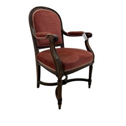 20th century French design mahogany fauteuil armchair, moulded and beaded framed, upholstered in pink fabric, rolled arms over acanthus leaf carved supports, on turned and fluted front supports united by curved X-framed stretcher 