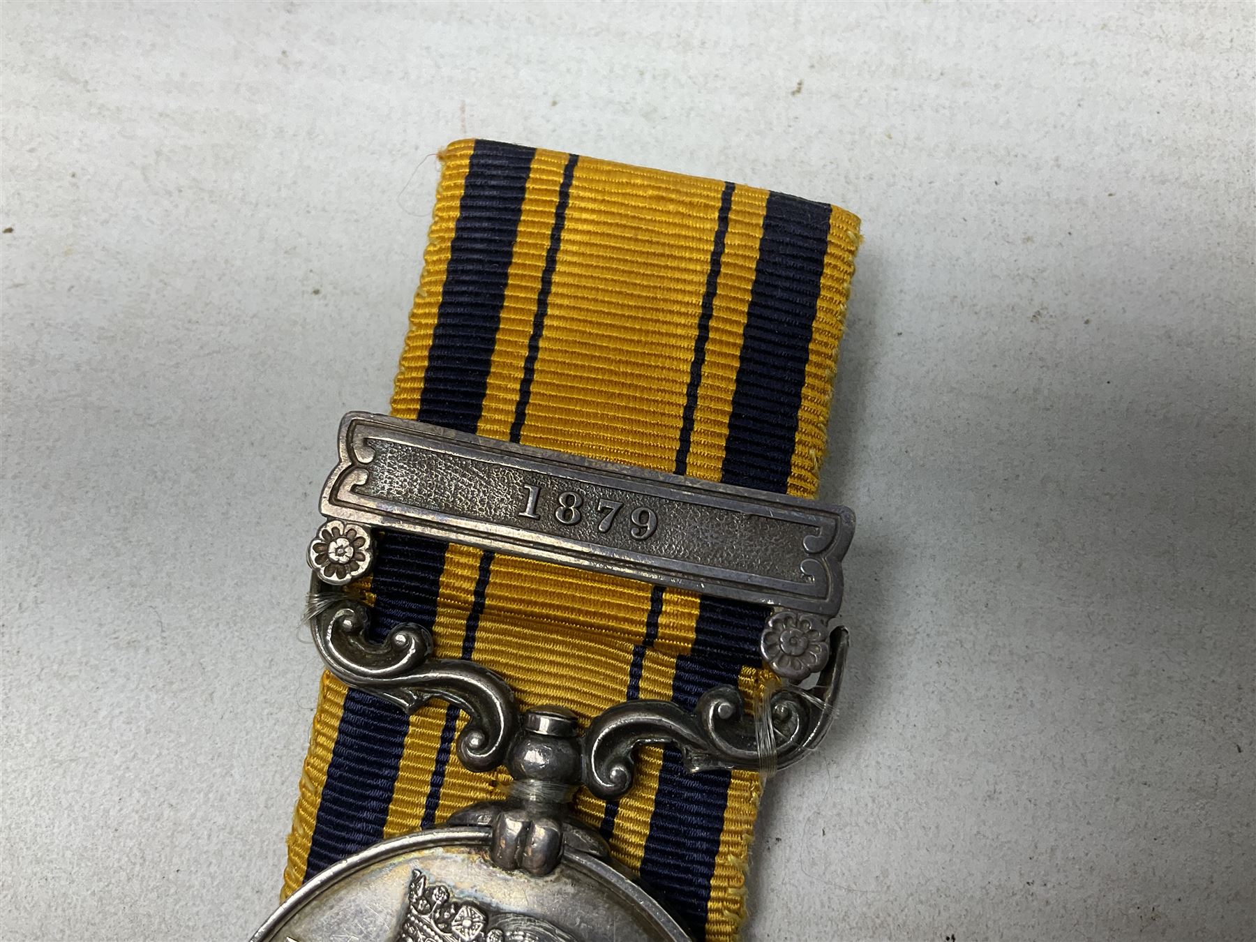 Victoria South Africa (Zulu) Medal with clasp for 1879, awarded to 2112 Pte. T. Cook 1st Dgn. Gds. with card stiffened ribbon