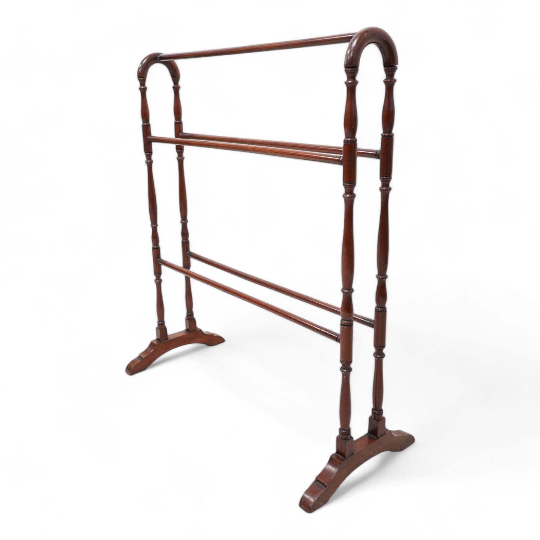 Three Victorian walnut towel rails - one with shaped and pierced cresting rails with square supports and splayed feet, united by chamfered rails (H90cm), two turned examples (3)