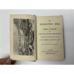 Early 20th century Hieroglyphic Bible or Select Passages from the Old and New Testament Represented by Emblematical Figures For The Amusement and Instruction of Youth, pub. Houlston and Sons, London, together with a wooden crucifix with metal banding and details, including skull and crossbones motif, and one other crucifix
