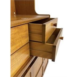 Nathan - teak wall unit, raised shelves over four drawers and double cupboard