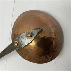 Large 19th century copper slotted spoon, with pierced flat bowl, L55cm, together with two 19th century iron handled ladles with circular copper bowls, largest example L48.5cm, (3)