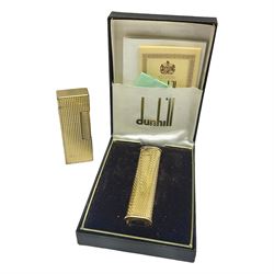 Dunhill gold plated dress lighter, in original fitted case with paperwork, together with a Dunhill rolagas lighter