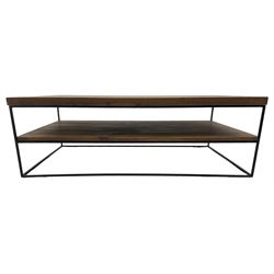 Samba oak coffee table, rectangular top over undertier storage, applied mid-tone finish, supported by black metal frame