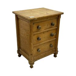 19th century stripped pine pedestal chest, hinged rectangular top with three planks and rounded edges, over three simulated drawer fronts with turned knobs, on turned baluster feet