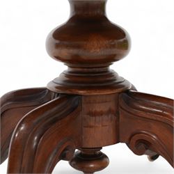 Victorian mahogany loo or centre table, moulded oval tilt-top, turned pedestal on four out splayed carved supports with scrolled terminals, on brass and ceramic castors 