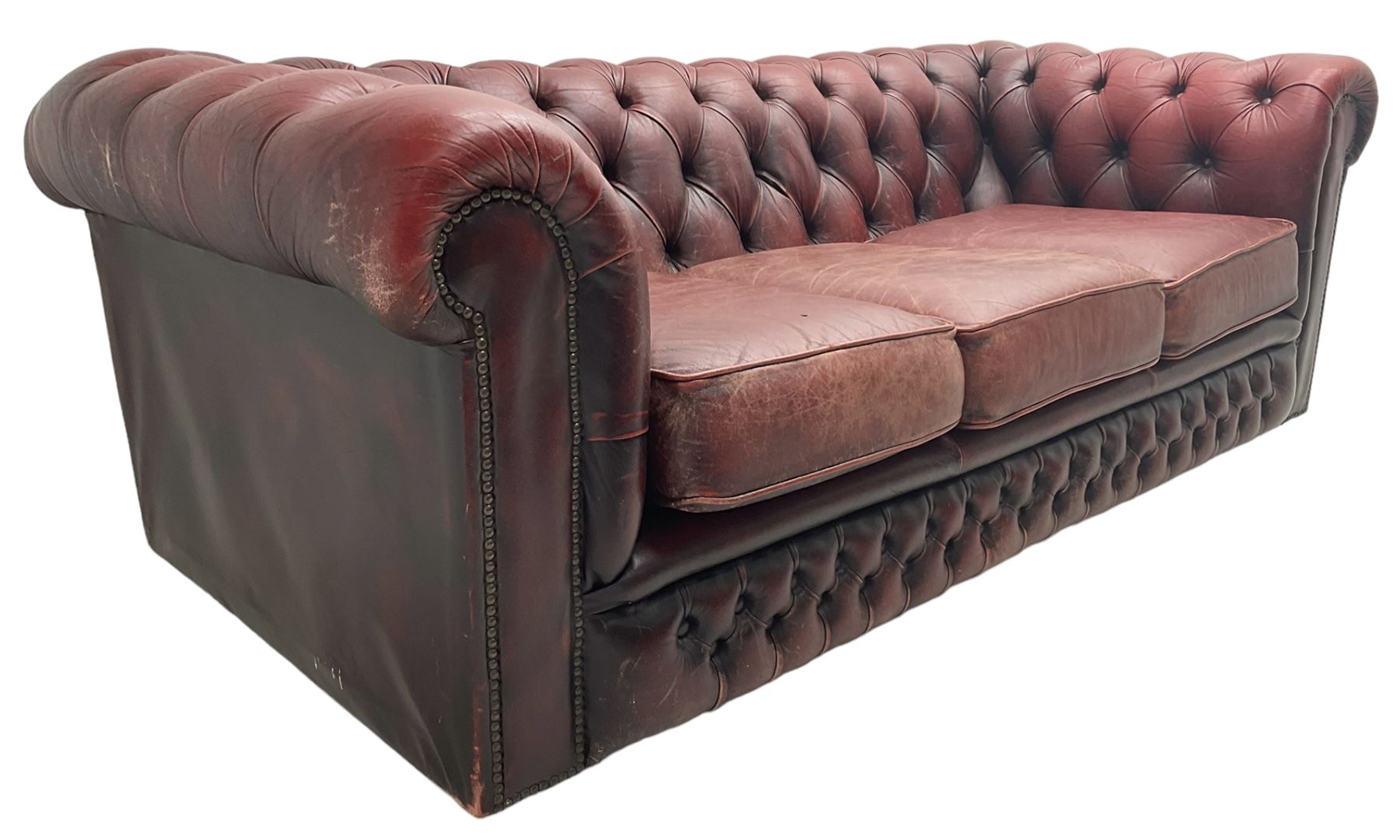 Chesterfield three-seat sofa upholstered in red buttoned leather