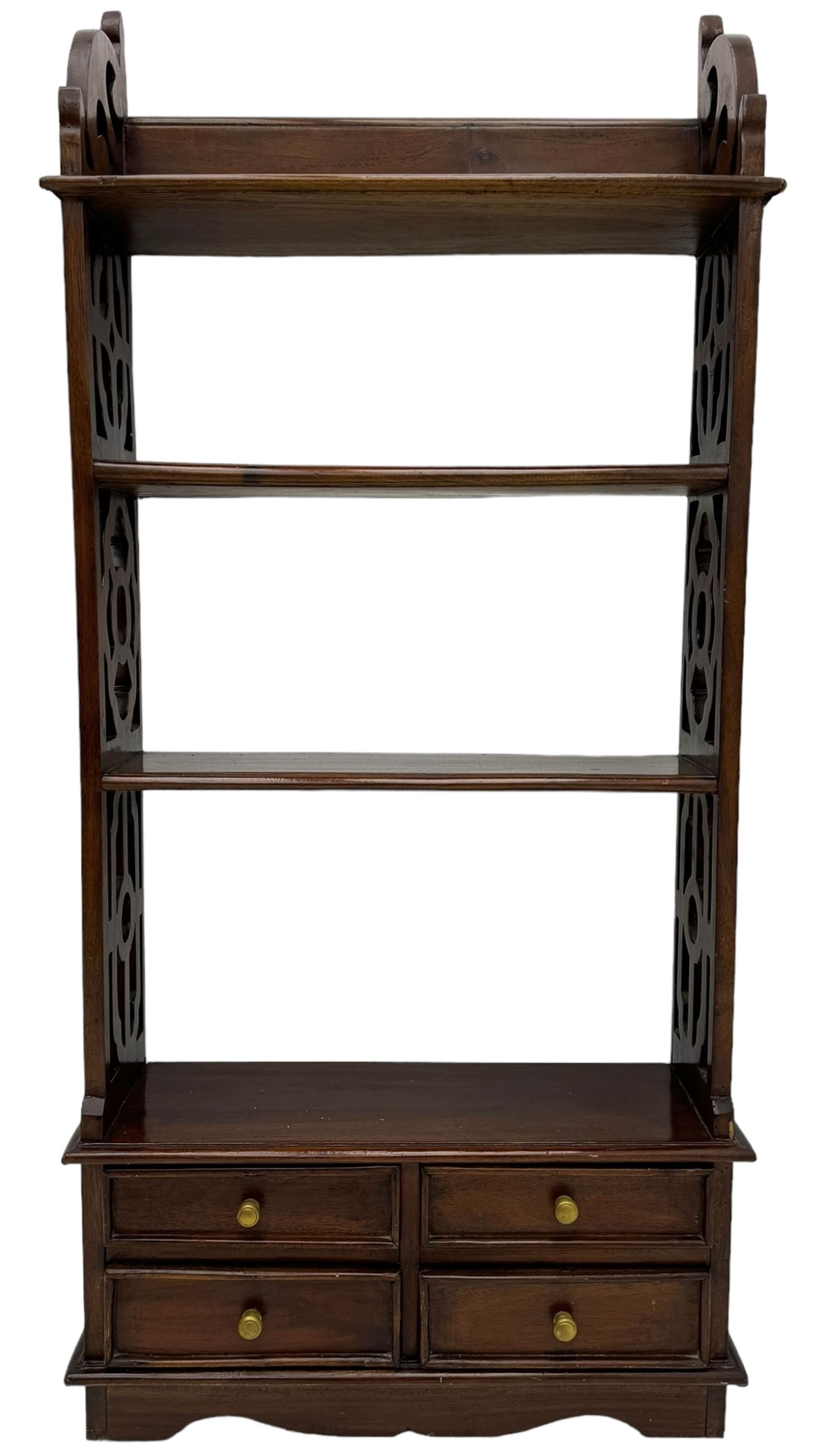 Georgian design mahogany open bookcase, fitted with three open shelves flanked by pierced uprights, with four drawers to the base with scalloped apron