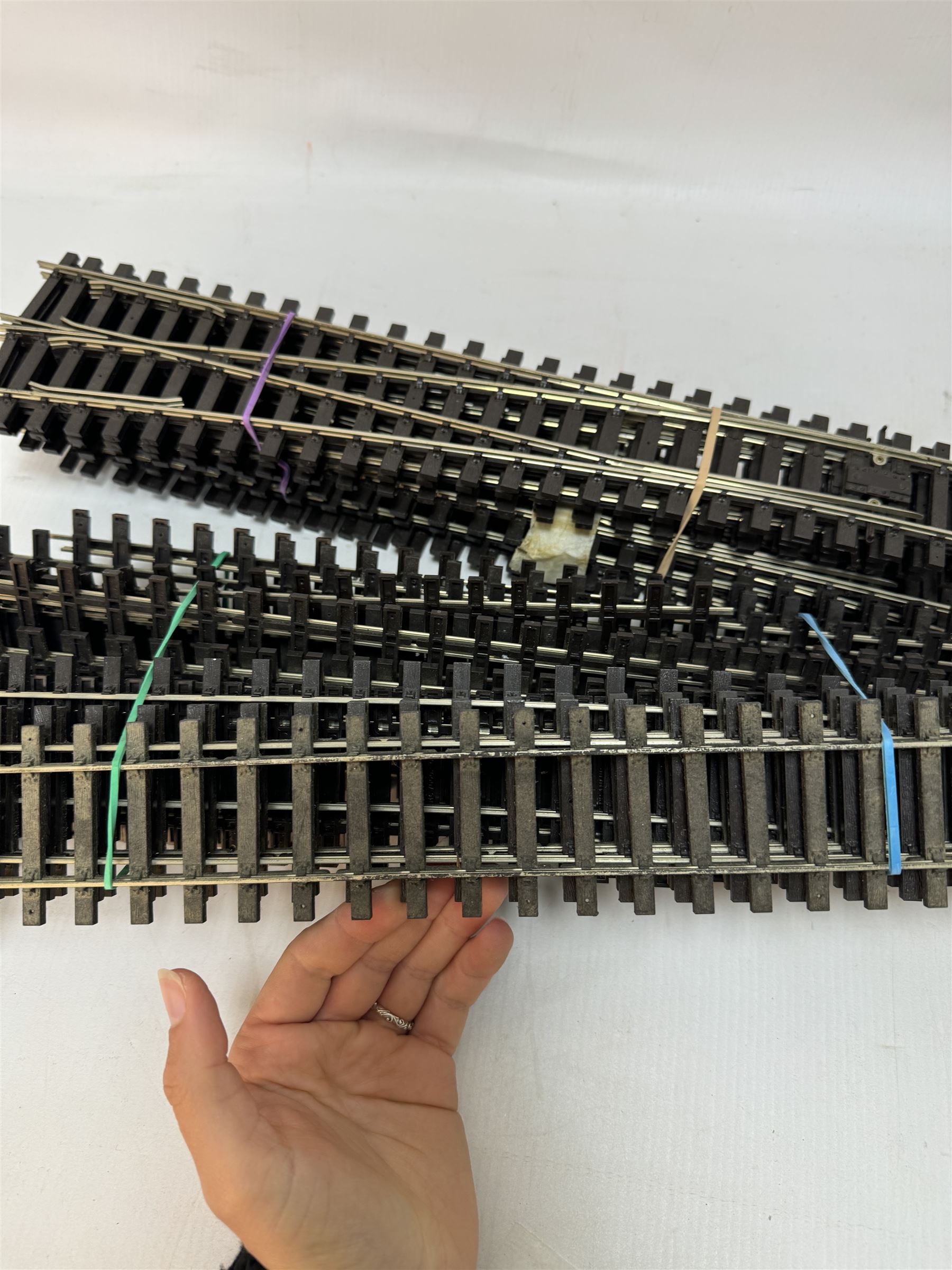 18m O gauge track of various lengths, together with a Gaugemaster Electronic Loco Controller unit and a small quantity of signals