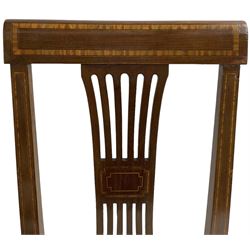 Set of four (2+2_ Edwardian inlaid mahogany dining chairs, cresting rail with satinwood banding, pierced splat backs with central inlay, drop-in seats upholstered in foliate patterned ivory fabric, raised on square tapering supports terminating in spade feet