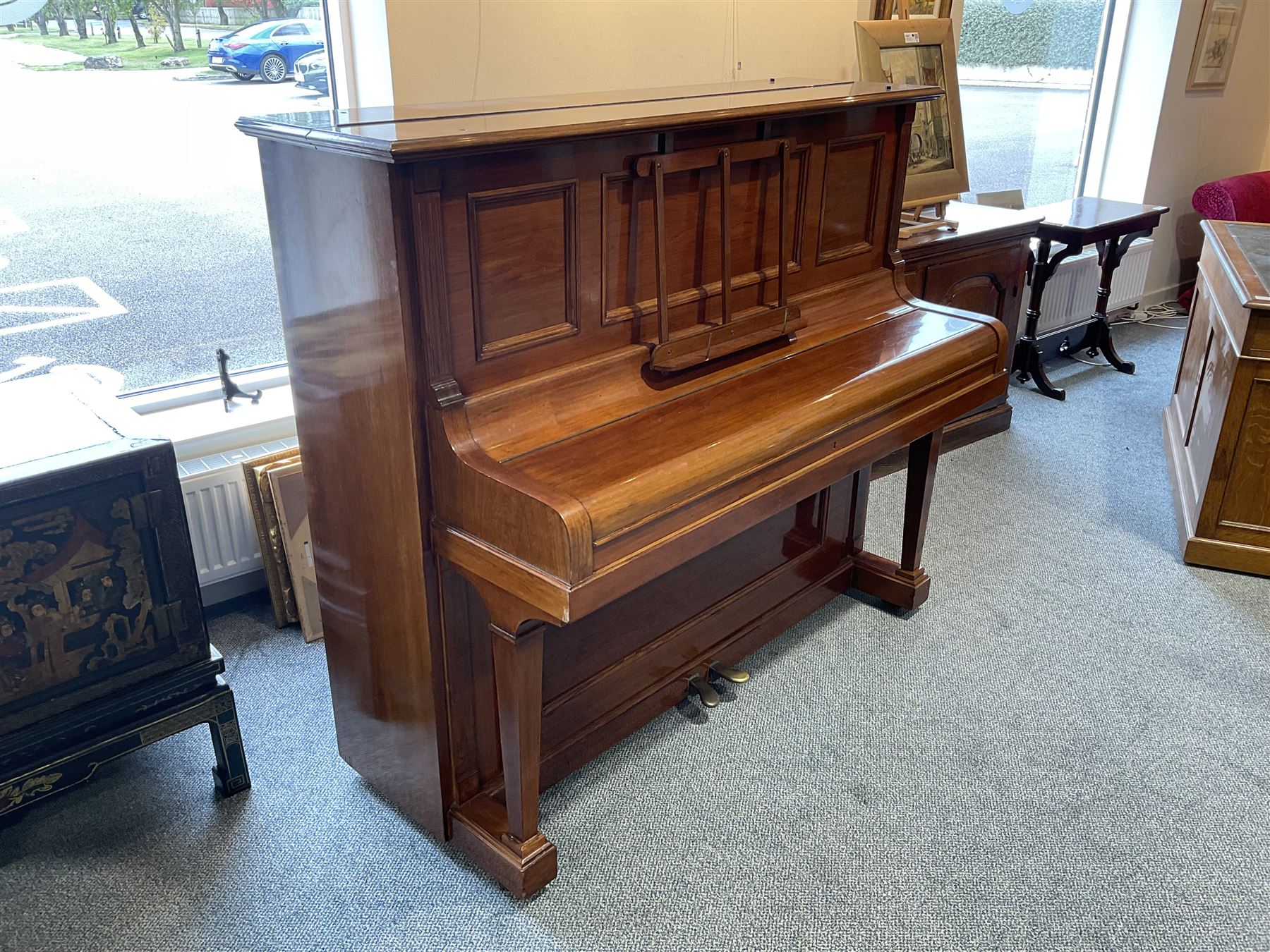 Bluthner of Leipzig - Early 20th century overstrung upright piano, serial number 79496 (1910), in a mahogany case with three front case panels and folding music desk, with 85 keys (seven octaves) underdamper action, original hammers, stringing, tuning pins, dampers and felts, with sostenuto and sustain pedals. Julius Bluthner was considered to be one of the the best makers of German upright pianos in the early 20th century both for tone quality and build. 

This item has been registered for sale under Section 10 of the APHA Ivory Act.