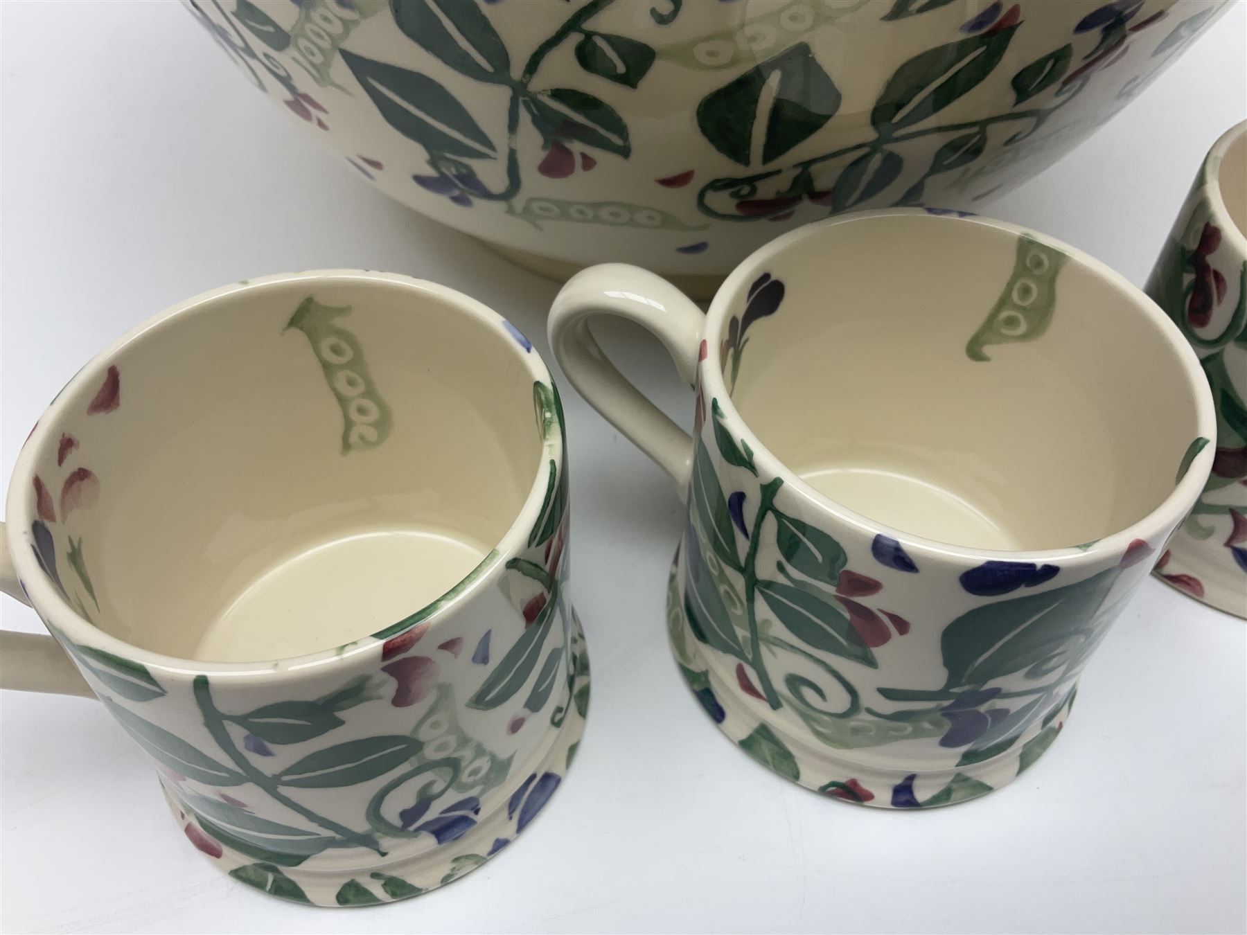 Emma Bridgewater ceramics in Sweet Pea pattern, comprising three cups and a large bowl,  bowl D31cm