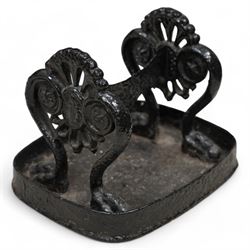 Victorian cast iron boot scraper, on curved supports with claw feet, black paint finish 