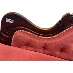 Victorian mahogany framed chaise longue, upholstered in pink velvet, the scrolled back with button-tufting, on turned feet