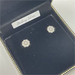 Pair of silver cubic zirconia daisy earrings, boxed 