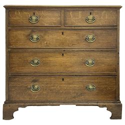 George III oak chest, moulded rectangular top, fitted with two short and three long graduating cock-beaded drawers, on bracket feet 