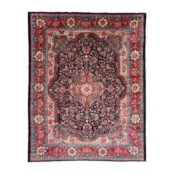 Persian Mahal indigo ground carpet, floral medallion on a field of swirling leafy branches...