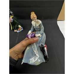 Four Royal Doulton figures, comprising The Parson's Daughter HN564, Dorothy HN3098, Christmas Parcels HN2851 and Biddy Pennyfarthing HN1843