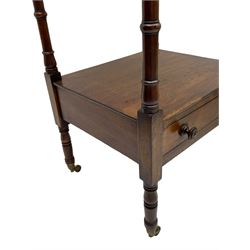 Regency mahogany etagere, the hinged and adjustable top over two tiers and single drawer, turned supports on brass cups and castors 