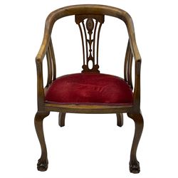 Early 19th century mahogany elbow chair, shaped cresting rail carved with foliate scrolls over Gothic pierced splat, upholstered drop-in seat, on square tapering moulded front supports united by stretchers (W51cm, H94cm); early 20th century walnut tub-shaped elbow chair, pierced splat back, upholstered seat on cabriole supports carved with ball and claw feet (W60cm, H84cm); George III mahogany side chair, shaped cresting rail over Hepplewhite design back, upholstered drop-in seat, on square tapering supports with H shaped stretchers (H945cm)