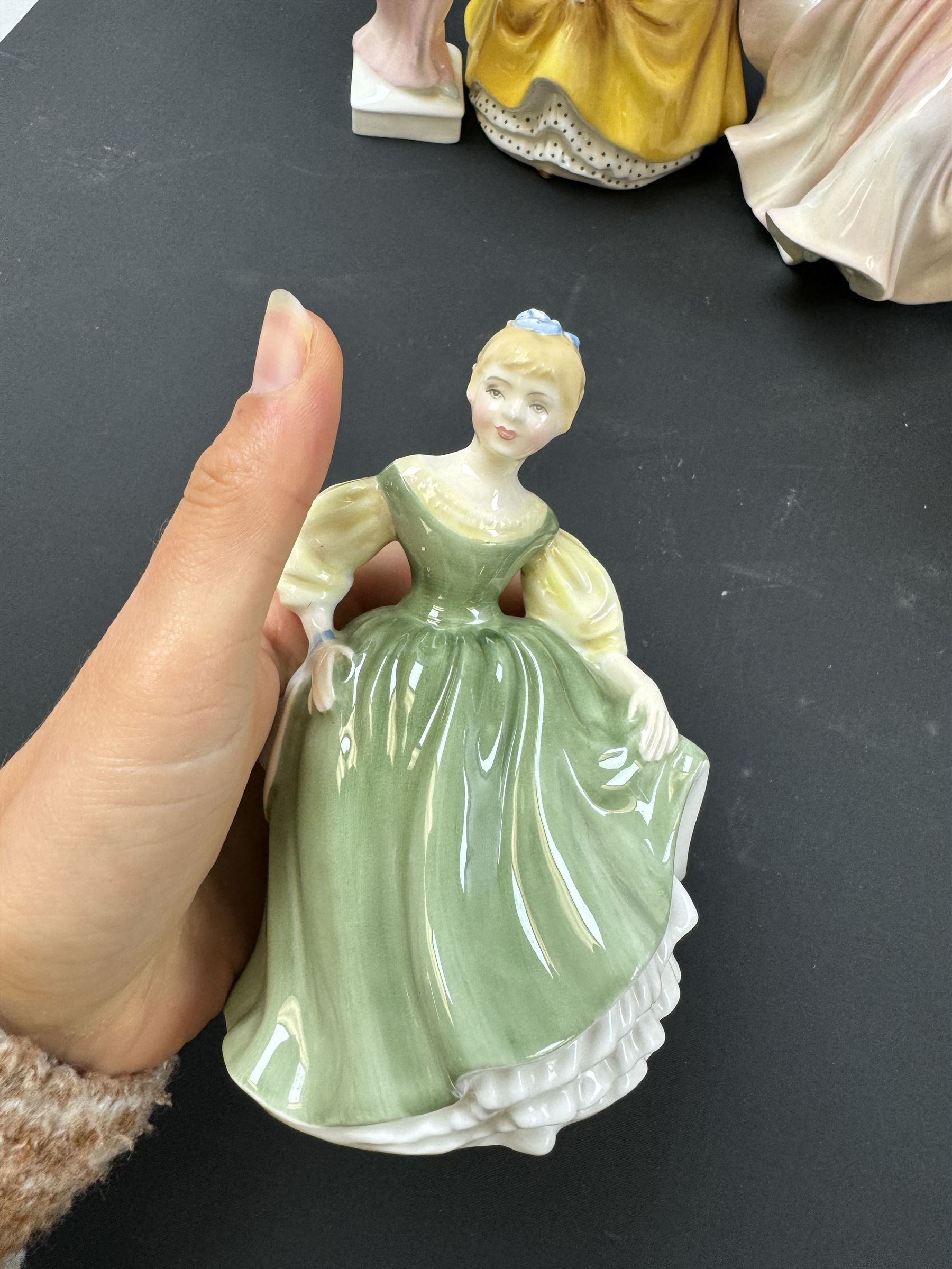 Eight Royal Doulton figures, including Southern Belle, Soiree, Sandra etc 