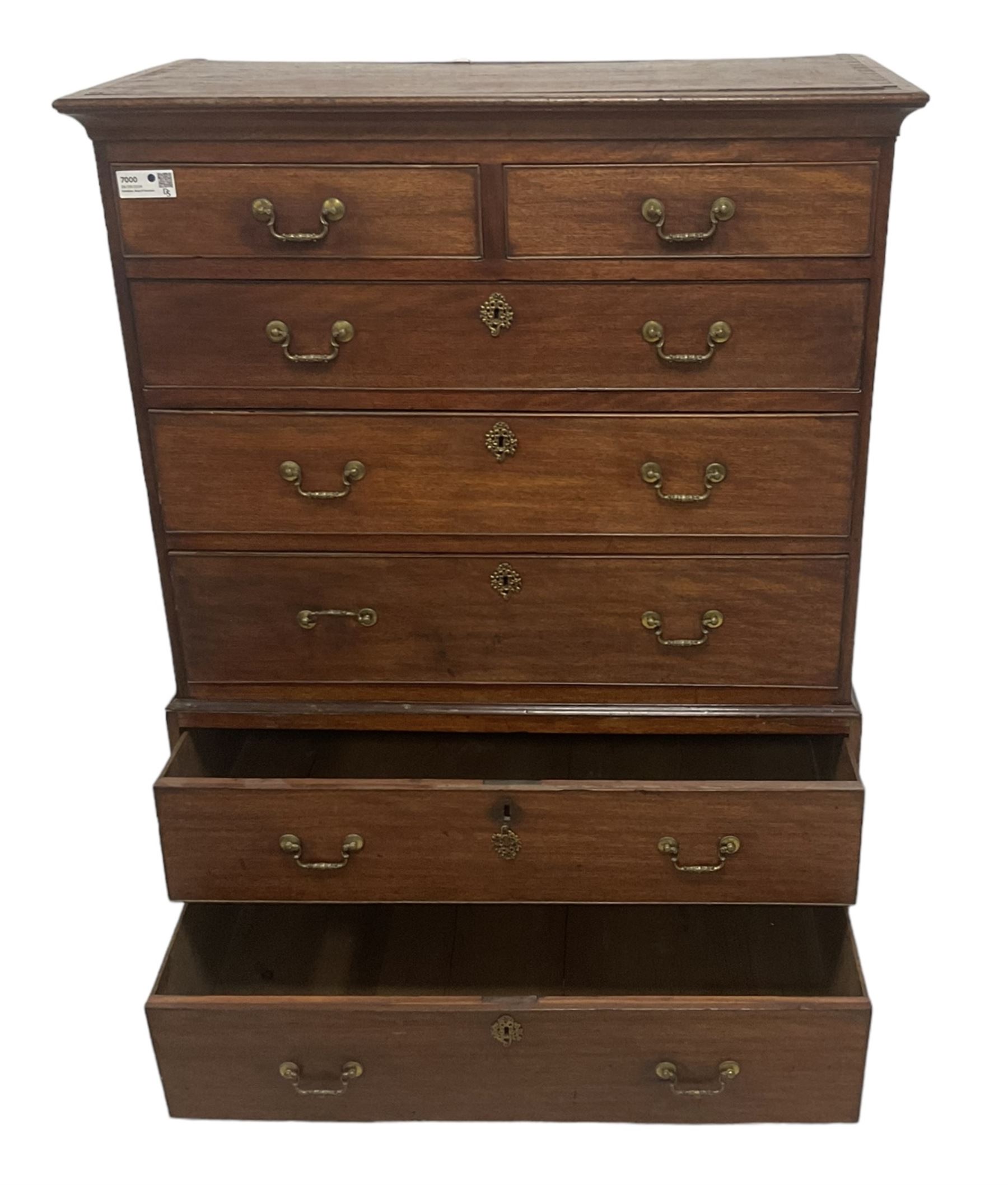 George III mahogany chest-on-chest, projecting cornice over two short and five long graduating cock-beaded drawers, each fitted with original brass swan neck handles, raised on bracket feet