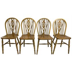 Set of four elm and beech wheelback dining chairs