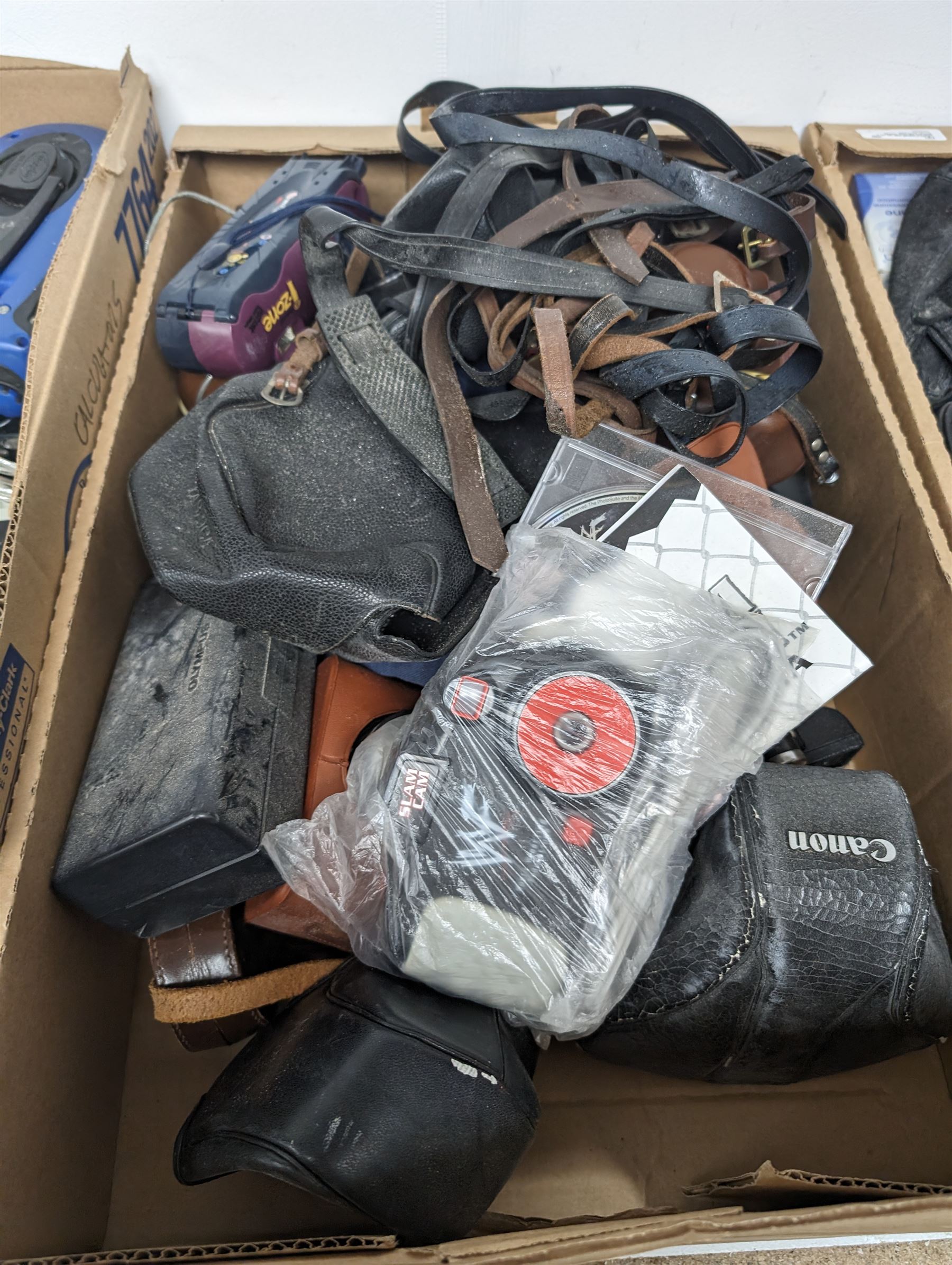 Collection of camera equipment, including camera bodies, lenses cases etc in three boxes 