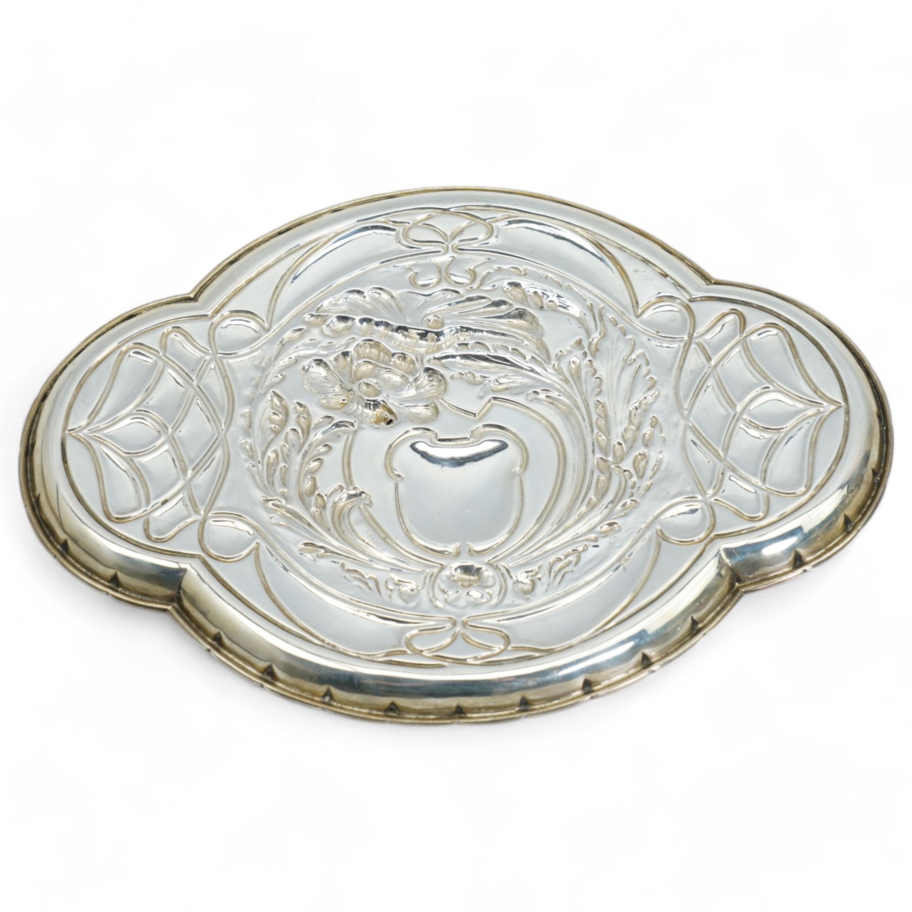 Edwardian Art Nouveau silver dressing table tray of lobed oval design with embossed decoration and cartouche W31cm Birmingham 1907 Maker William Adams Ltd 